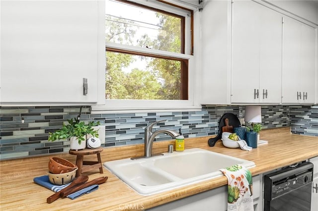 1168 Laburnum Ave, Chico, CA 95926 - kitchen featuring dishwasher, light countertops, white cabinetry, and backsplash