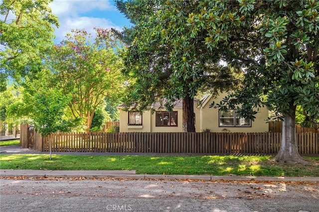 1168 Laburnum Ave, Chico, CA 95926 - view of home's exterior with stucco siding and a fenced front yard