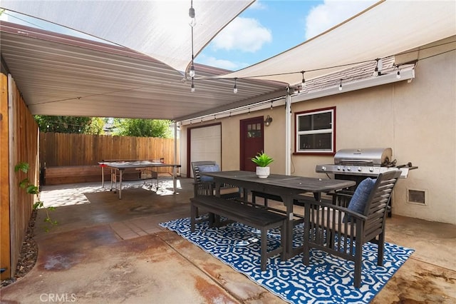 1168 Laburnum Ave, Chico, CA 95926 - view of patio featuring outdoor dining space and a grill