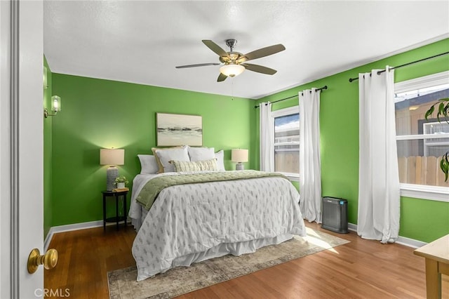 1168 Laburnum Ave, Chico, CA 95926 - bedroom with wood finished floors and a ceiling fan