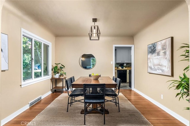 1168 Laburnum Ave, Chico, CA 95926 - dining room with dark wood finished floors and baseboards
