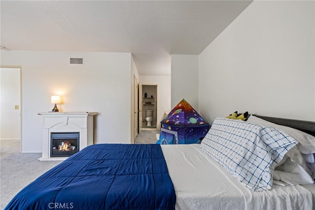 1007 Flintlock Rd, Diamond Bar, CA 91765 - bedroom with carpet flooring, a warm lit fireplace, and connected bathroom