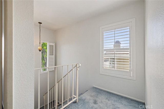 1007 Flintlock Rd, Diamond Bar, CA 91765 - hallway with an upstairs landing, plenty of natural light, and carpet floors