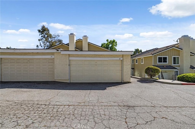 1007 Flintlock Rd, Diamond Bar, CA 91765 - view of front of house featuring a chimney