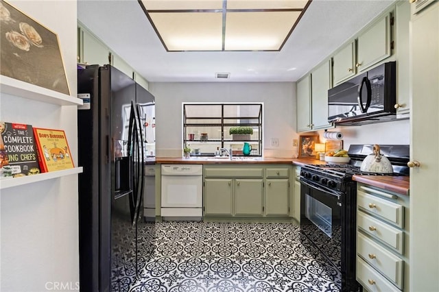 1007 Flintlock Rd, Diamond Bar, CA 91765 - kitchen with black appliances, green cabinets, butcher block countertops, and light floors