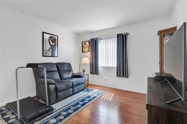 26966 Flo Ln Unit 319, Canyon Country, CA 91351 - living area featuring wood finished floors and baseboards