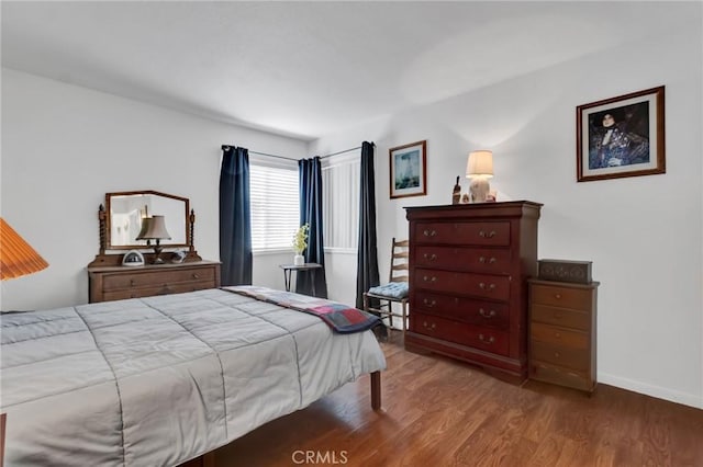 26966 Flo Ln Unit 319, Canyon Country, CA 91351 - bedroom featuring wood finished floors and baseboards