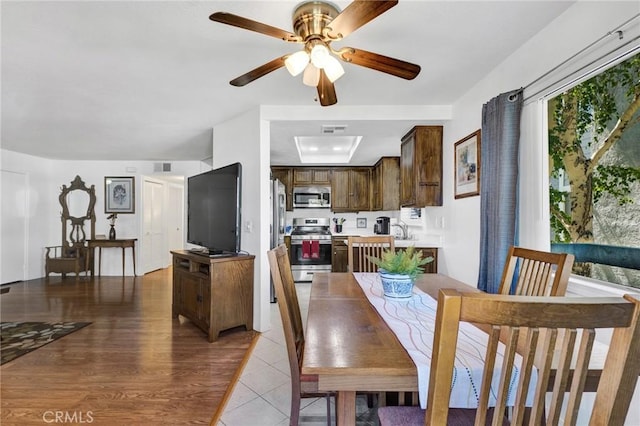 26966 Flo Ln Unit 319, Canyon Country, CA 91351 - dining room with ceiling fan and light wood-type flooring