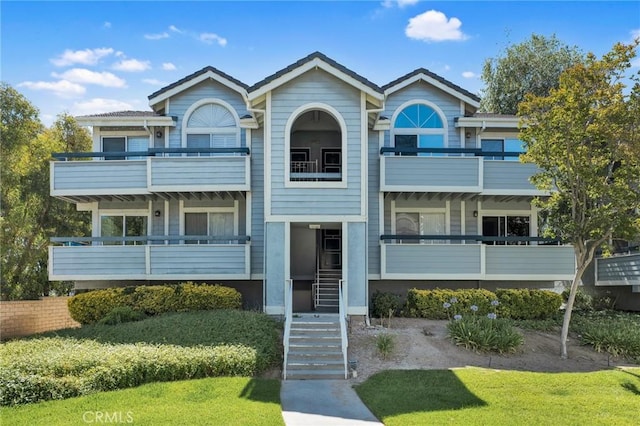 26966 Flo Ln Unit 319, Canyon Country, CA 91351 - view of front of house featuring a balcony