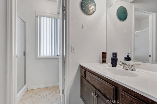 26966 Flo Ln Unit 319, Canyon Country, CA 91351 - full bathroom with vanity, a shower stall, and tile patterned flooring