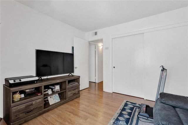 26966 Flo Ln Unit 319, Canyon Country, CA 91351 - living room with light wood finished floors