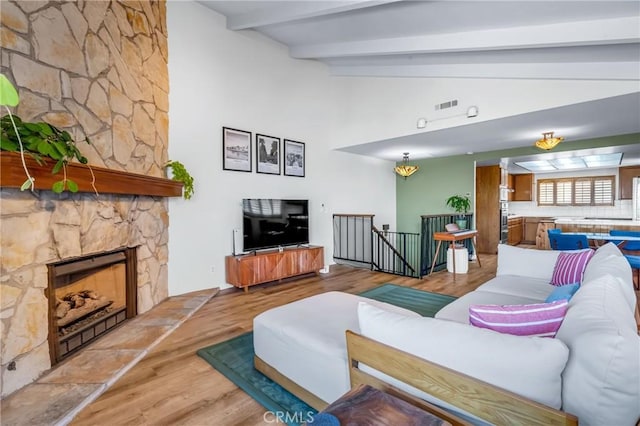 2433 S Gaffey St, San Pedro, CA 90731 - living area featuring light wood-style flooring and a fireplace