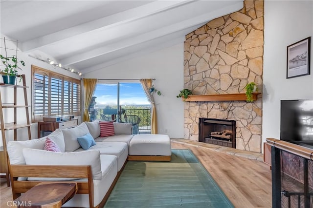 2433 S Gaffey St, San Pedro, CA 90731 - living area featuring wood finished floors and a stone fireplace