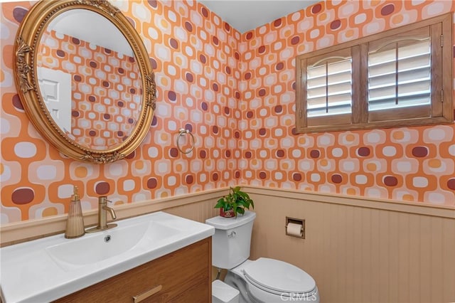 2433 S Gaffey St, San Pedro, CA 90731 - bathroom featuring wallpapered walls, wainscoting, and vanity
