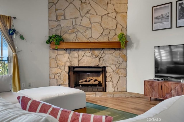 2433 S Gaffey St, San Pedro, CA 90731 - living area featuring a stone fireplace and wood finished floors