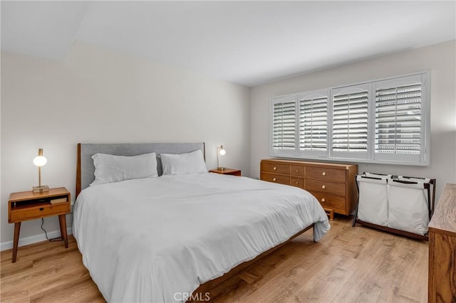 2433 S Gaffey St, San Pedro, CA 90731 - bedroom featuring light wood-style flooring and baseboards