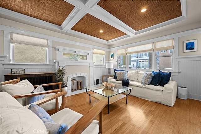 6025 E Ocean Blvd, Long Beach, CA 90803 - living room featuring plenty of natural light, ornamental molding, a fireplace with flush hearth, coffered ceiling, and light wood-style flooring