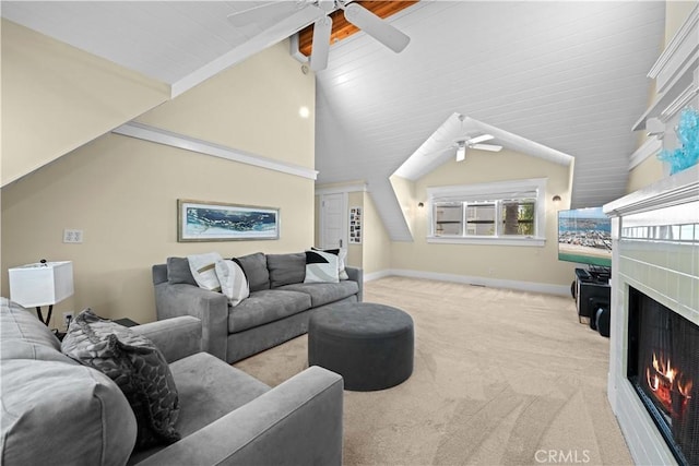 6025 E Ocean Blvd, Long Beach, CA 90803 - carpeted living area with a ceiling fan, lofted ceiling, and a lit fireplace
