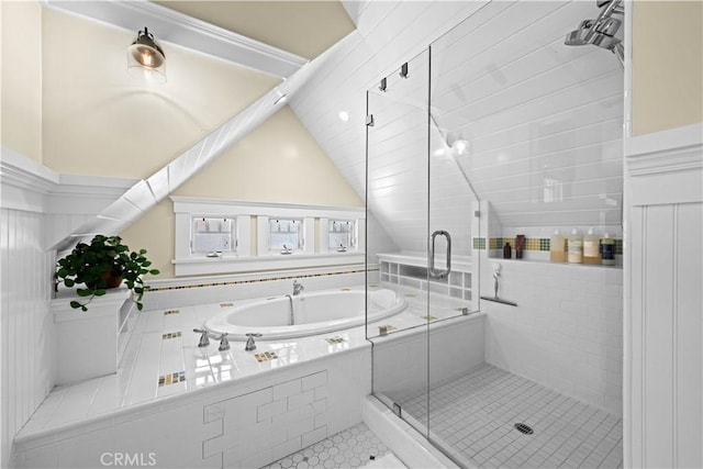 6025 E Ocean Blvd, Long Beach, CA 90803 - bathroom featuring a bath, a stall shower, lofted ceiling, and tile patterned floors