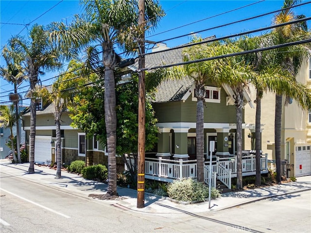 6025 E Ocean Blvd, Long Beach, CA 90803 - view of front of property featuring a porch and a garage