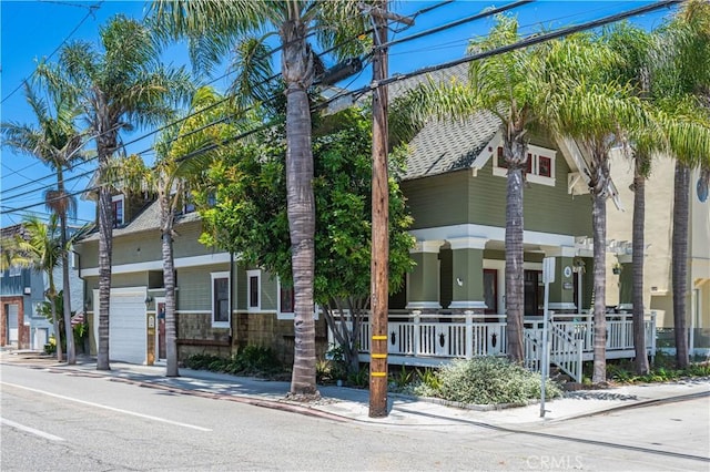 6025 E Ocean Blvd, Long Beach, CA 90803 - view of front of property with a porch and a garage