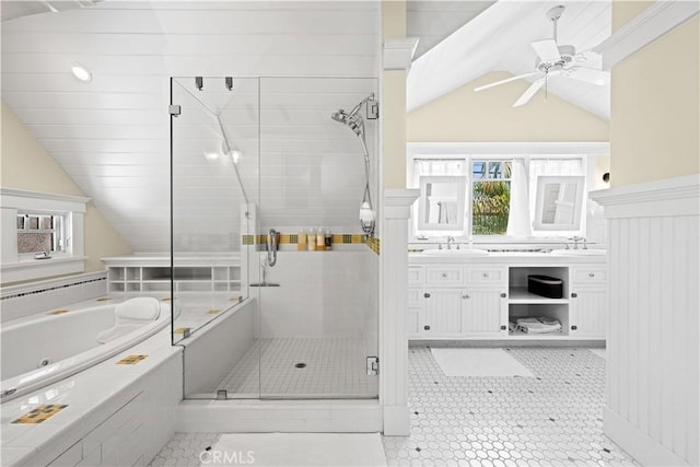 6025 E Ocean Blvd, Long Beach, CA 90803 - bathroom with vaulted ceiling, a shower stall, a jetted tub, double vanity, and a ceiling fan
