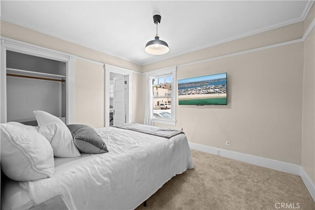 6025 E Ocean Blvd, Long Beach, CA 90803 - bedroom with carpet floors, a closet, and ornamental molding