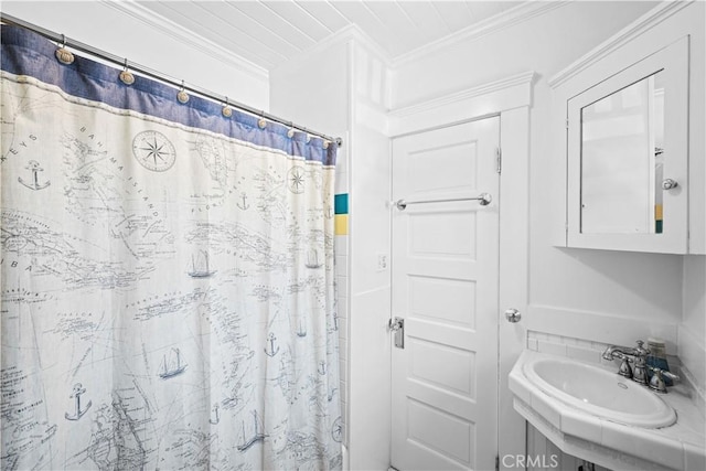 6025 E Ocean Blvd, Long Beach, CA 90803 - bathroom with crown molding and curtained shower