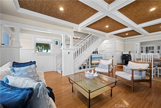 6025 E Ocean Blvd, Long Beach, CA 90803 - living area with decorative columns, stairway, light wood-style floors, ornamental molding, and coffered ceiling