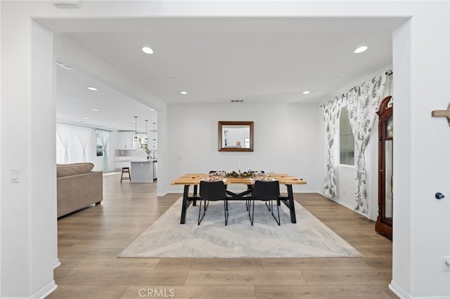 32084 Richardson St, Menifee, CA 92584 - dining room featuring wood finished floors and recessed lighting