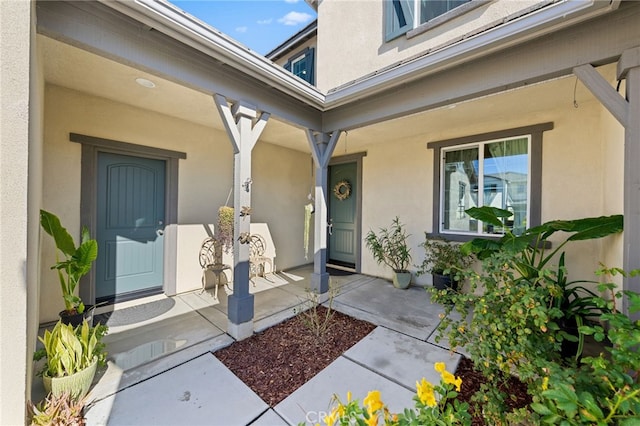 32084 Richardson St, Menifee, CA 92584 - doorway to property with a porch and stucco siding