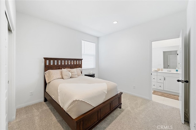 32084 Richardson St, Menifee, CA 92584 - bedroom featuring light colored carpet, ensuite bath, and recessed lighting
