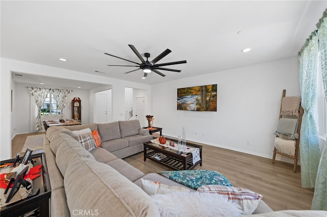 32084 Richardson St, Menifee, CA 92584 - living room with wood finished floors, recessed lighting, and a ceiling fan