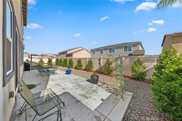 32084 Richardson St, Menifee, CA 92584 - fenced backyard featuring a patio area, a residential view, and outdoor dining area