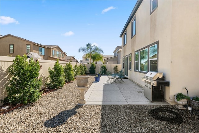 32084 Richardson St, Menifee, CA 92584 - fenced backyard featuring a patio area, a grill, and a residential view