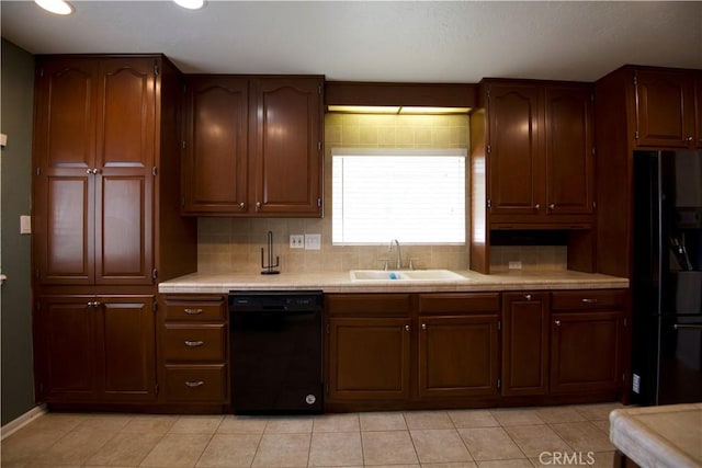 45011 16th St W, Lancaster, CA 93534 - kitchen featuring black appliances, tile counters, decorative backsplash, light tile patterned flooring, and recessed lighting