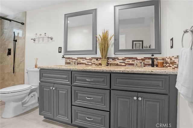 12674 Metate Ln, Poway, CA 92064 - bathroom with double vanity, tiled shower, tasteful backsplash, and tile patterned flooring
