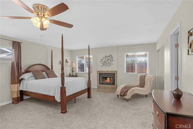 12674 Metate Ln, Poway, CA 92064 - bedroom featuring multiple windows, light colored carpet, and a fireplace