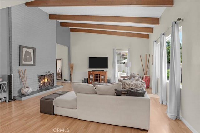 12674 Metate Ln, Poway, CA 92064 - living area featuring wood finished floors and a lit fireplace
