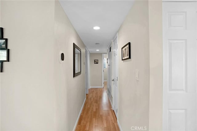12674 Metate Ln, Poway, CA 92064 - hallway featuring light wood-type flooring and recessed lighting