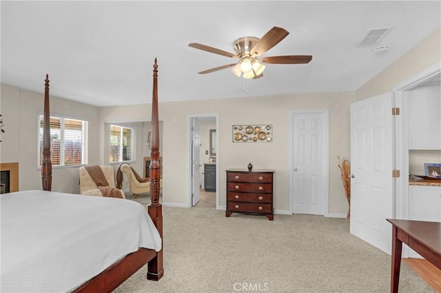 12674 Metate Ln, Poway, CA 92064 - bedroom featuring light colored carpet, a glass covered fireplace, and ceiling fan
