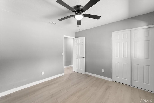 11343 1st Ave, Hesperia, CA 92345 - unfurnished bedroom featuring light wood-style floors, a closet, and a ceiling fan