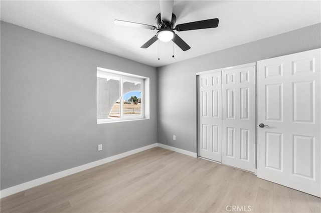 11343 1st Ave, Hesperia, CA 92345 - unfurnished bedroom with light wood-type flooring, a closet, and ceiling fan