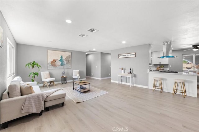 11343 1st Ave, Hesperia, CA 92345 - living area featuring recessed lighting, light wood finished floors, and a ceiling fan