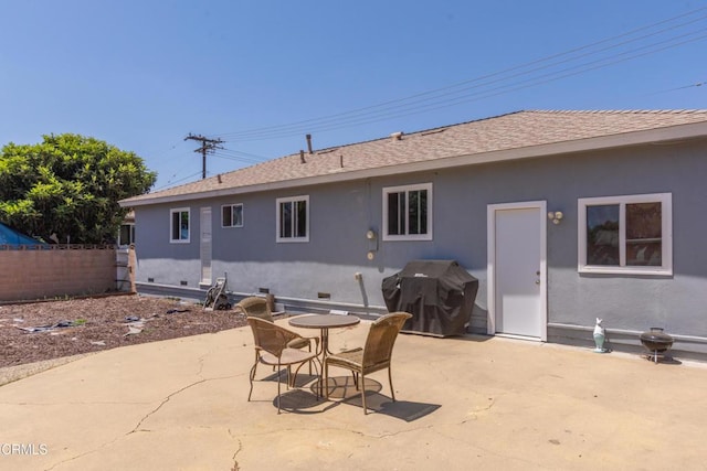 312 Lafayette Dr, Oxnard, CA 93036 - back of property featuring stucco siding, a patio area, and a shingled roof