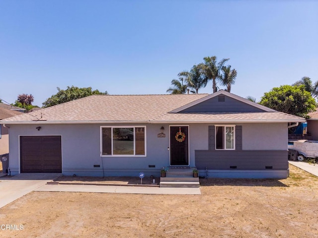 312 Lafayette Dr, Oxnard, CA 93036 - ranch-style house with a garage, crawl space, roof with shingles, driveway, and stucco siding
