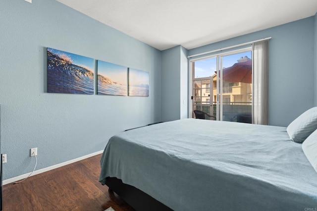 640 Camino De La Reina Unit 1108, San Diego, CA 92108 - bedroom featuring wood finished floors and access to exterior