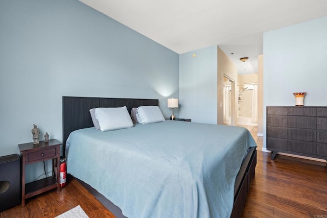 640 Camino De La Reina Unit 1108, San Diego, CA 92108 - bedroom with wood finished floors and connected bathroom