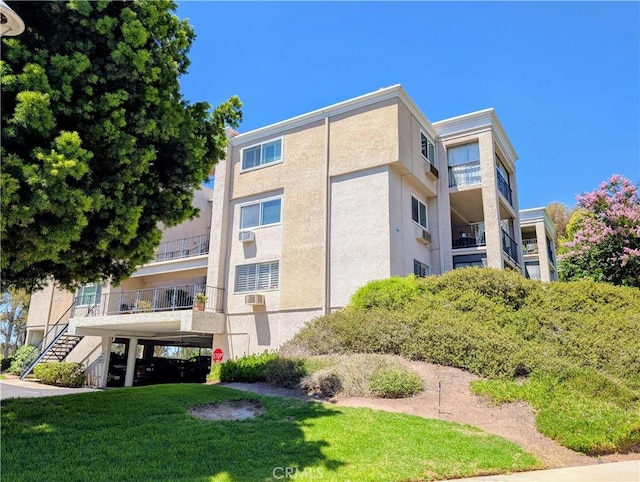 5499 Paseo Del Lago W Unit 3D, Laguna Woods, CA 92637 - view of building exterior with stairway