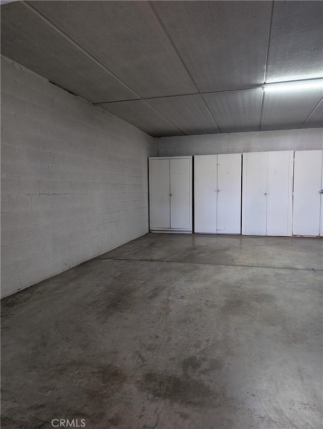 5499 Paseo Del Lago W Unit 3D, Laguna Woods, CA 92637 - garage with concrete block wall